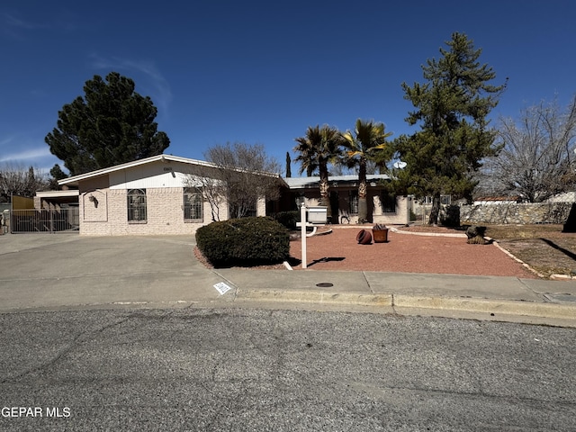 view of front of home with brick siding