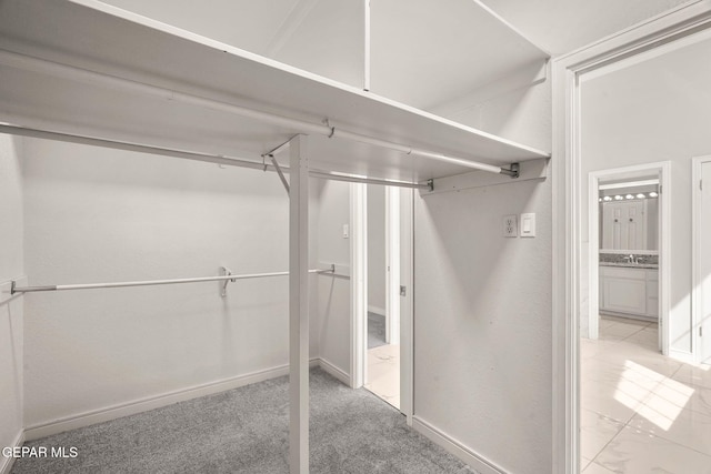 425 Golden Springs Dr, El Paso, TX 79912 - walk in closet featuring carpet and a sink