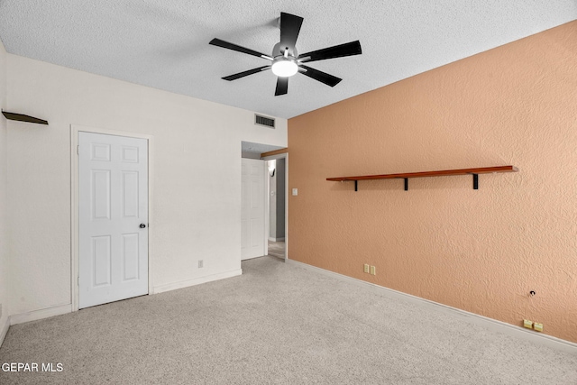 425 Golden Springs Dr, El Paso, TX 79912 - unfurnished bedroom with visible vents, a textured wall, a textured ceiling, and baseboards