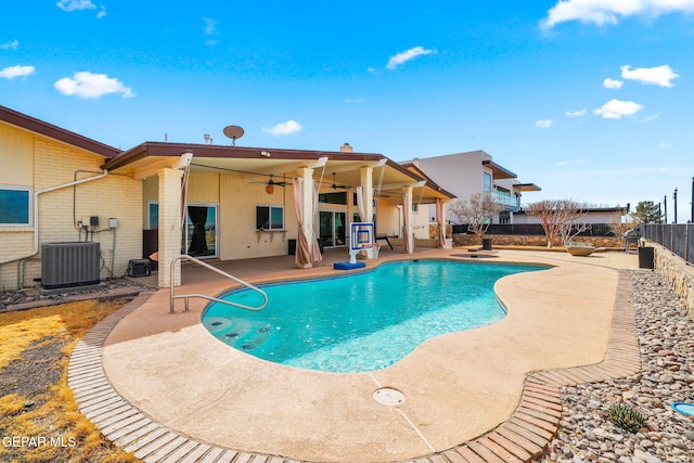 425 Golden Springs Dr, El Paso, TX 79912 - view of swimming pool with a patio, a hot tub, central AC, ceiling fan, and a fenced backyard