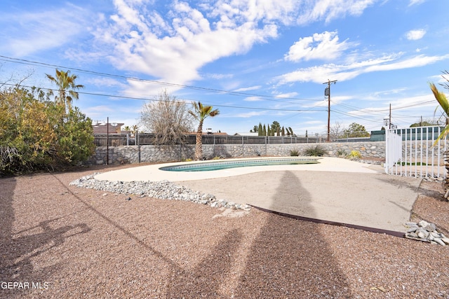 view of swimming pool with a patio, a fenced backyard, and a fenced in pool