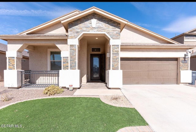 view of front of home featuring stone siding, a porch, and stucco siding