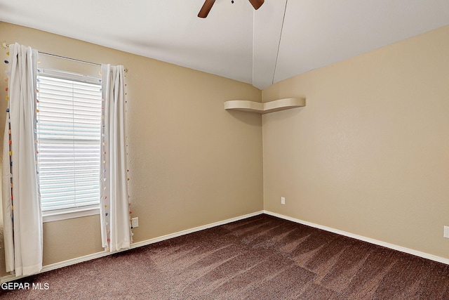 empty room featuring carpet floors, ceiling fan, and baseboards