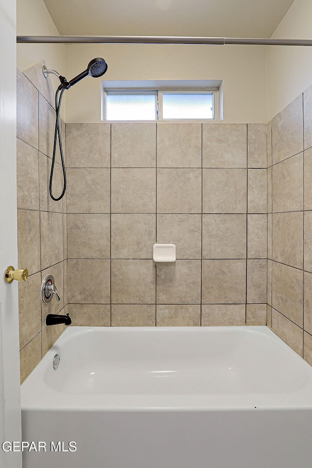 full bathroom featuring washtub / shower combination