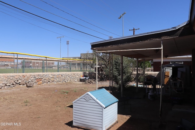 surrounding community featuring fence