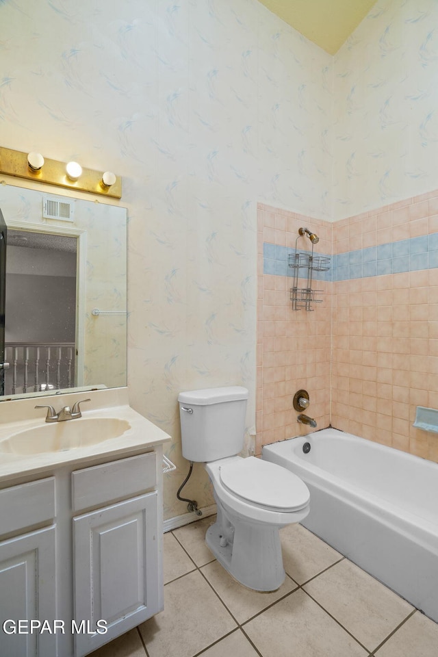 full bath featuring tile patterned flooring, vanity, and wallpapered walls