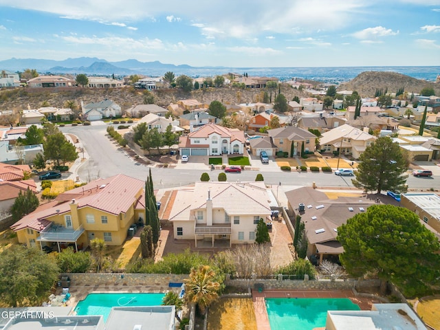 drone / aerial view with a residential view and a mountain view