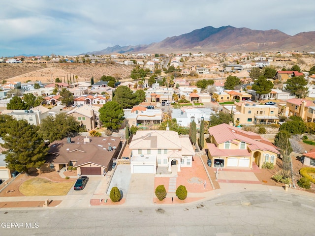 birds eye view of property featuring a residential view and a mountain view