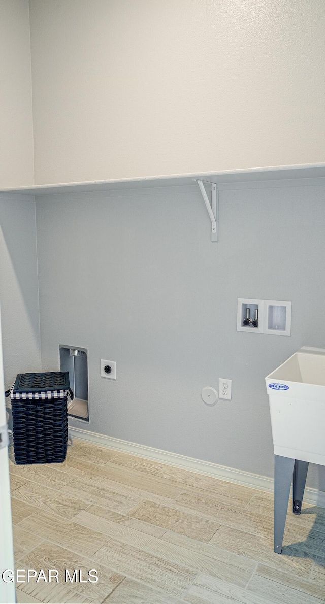 3853 Surmise St, El Paso, TX 79938 - laundry room featuring washer hookup and hookup for an electric dryer