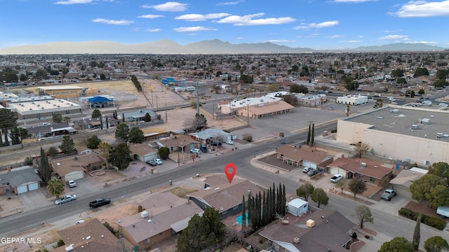 birds eye view of property with a residential view and a mountain view