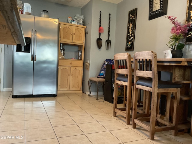 dining room featuring light tile patterned floors