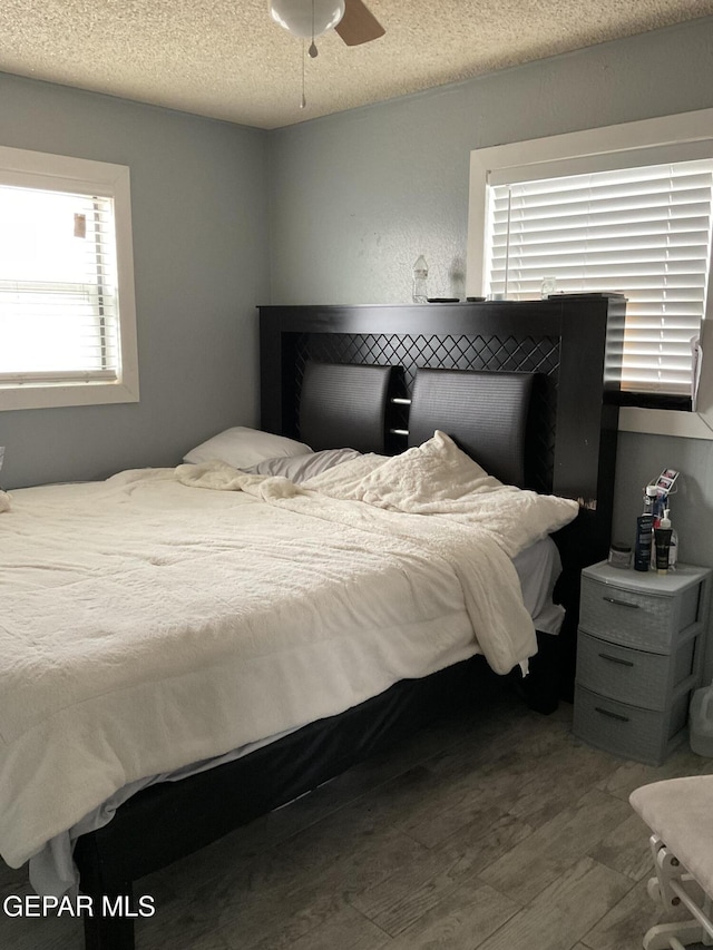 bedroom featuring a textured ceiling