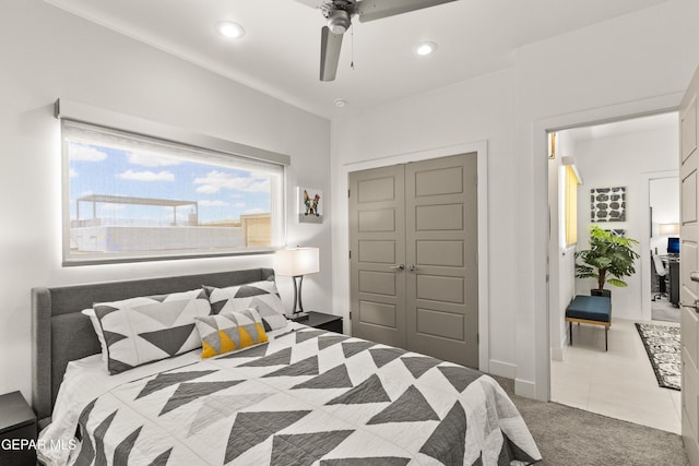 bedroom with a closet, carpet, a ceiling fan, and recessed lighting