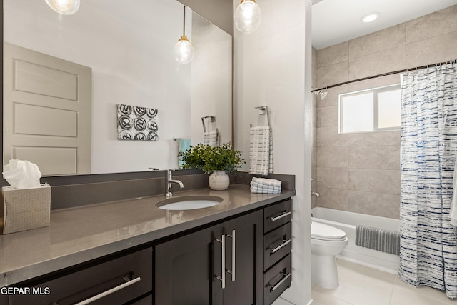 full bath with shower / bathtub combination with curtain, tile patterned flooring, vanity, and toilet