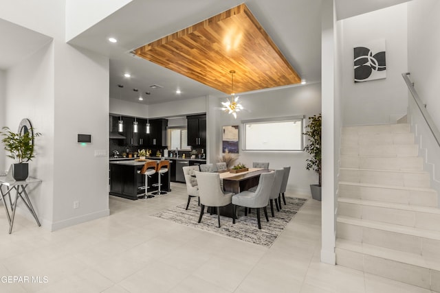 dining area with recessed lighting, stairway, and baseboards