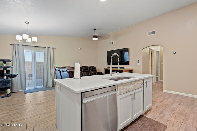 kitchen featuring light countertops, visible vents, open floor plan, white cabinets, and dishwasher