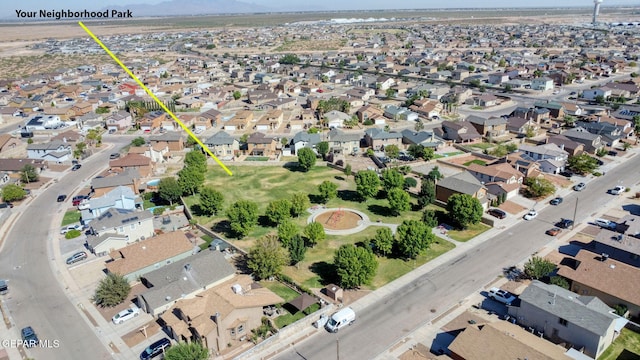 birds eye view of property with a residential view