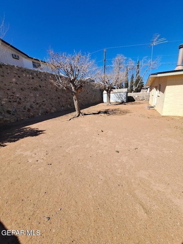 view of yard with fence