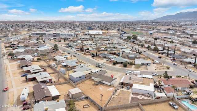 bird's eye view with a residential view and a mountain view