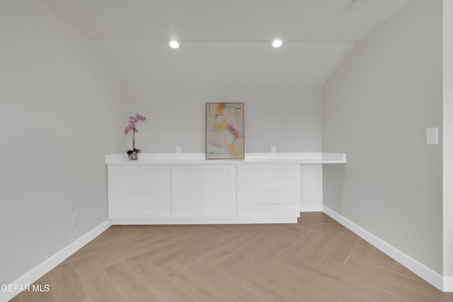 interior space featuring recessed lighting and baseboards