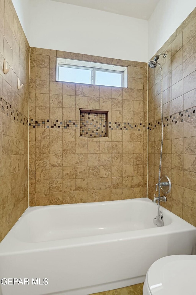 full bathroom with shower / tub combination and toilet