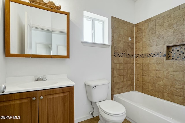 bathroom with toilet, bathing tub / shower combination, and vanity