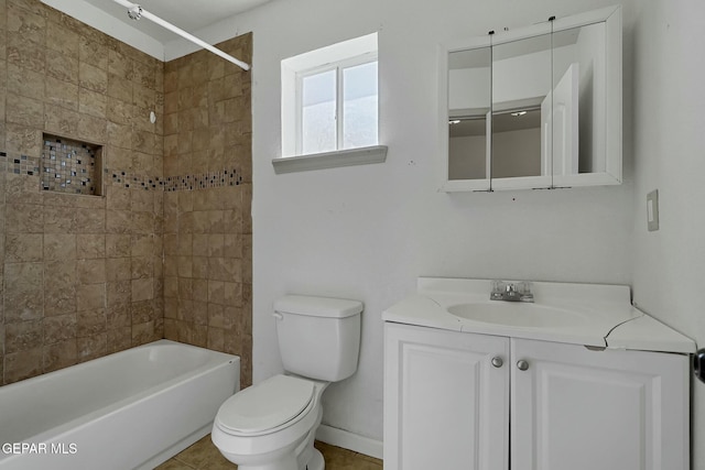 full bathroom featuring shower / bathtub combination, toilet, vanity, and baseboards