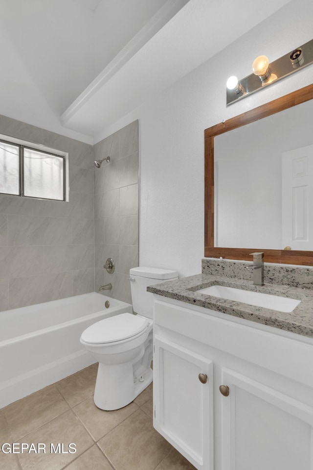 bathroom featuring  shower combination, tile patterned flooring, vanity, and toilet