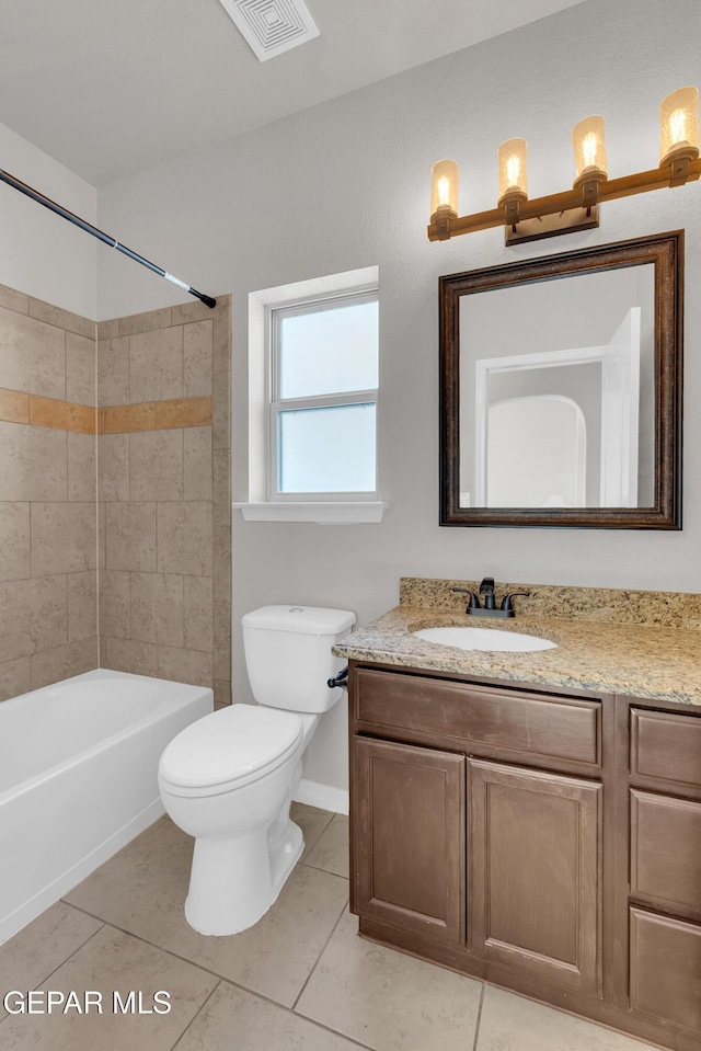 bathroom featuring shower / bath combination, visible vents, toilet, tile patterned flooring, and vanity