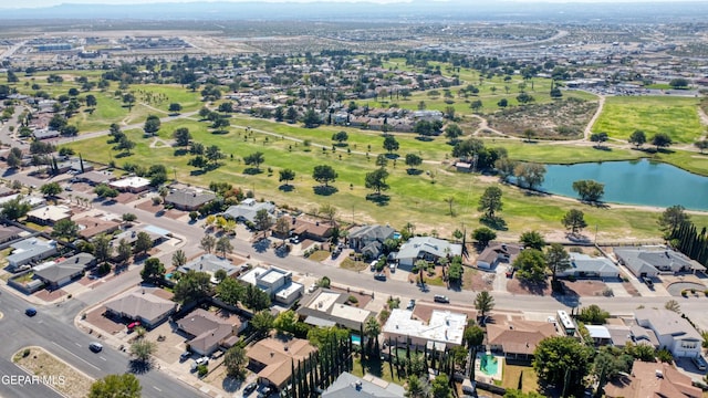 birds eye view of property featuring a water view and a residential view