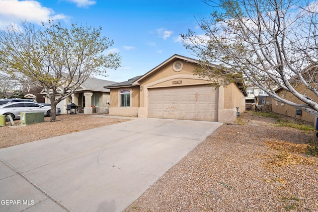 single story home featuring driveway, an attached garage, a shingled roof, and stucco siding