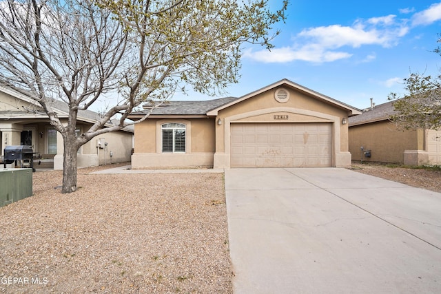 ranch-style house featuring a garage, driveway, a shingled roof, and stucco siding