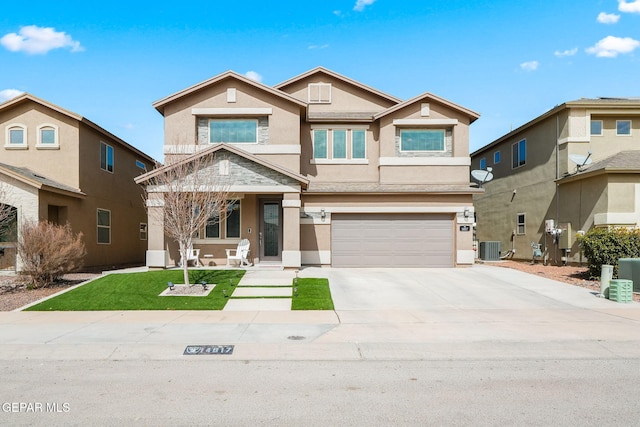 view of front of house with central air condition unit, stucco siding, concrete driveway, a front yard, and a garage