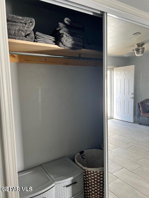 closet featuring washing machine and clothes dryer