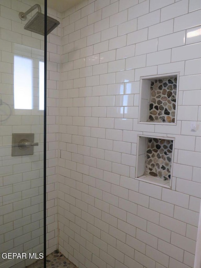 full bathroom featuring walk in shower