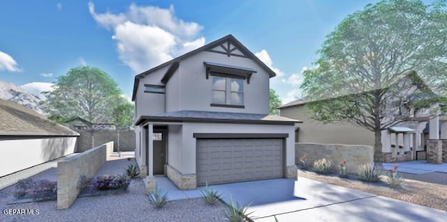 view of front of house featuring driveway, an attached garage, and stucco siding