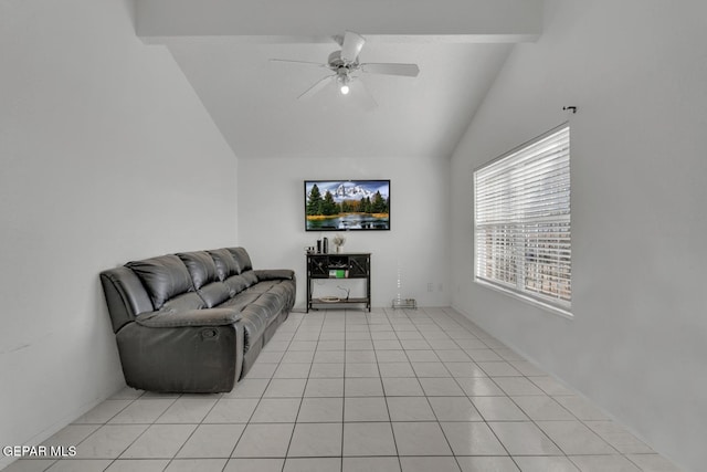 living room featuring lofted ceiling, a ceiling fan, and light tile patterned flooring