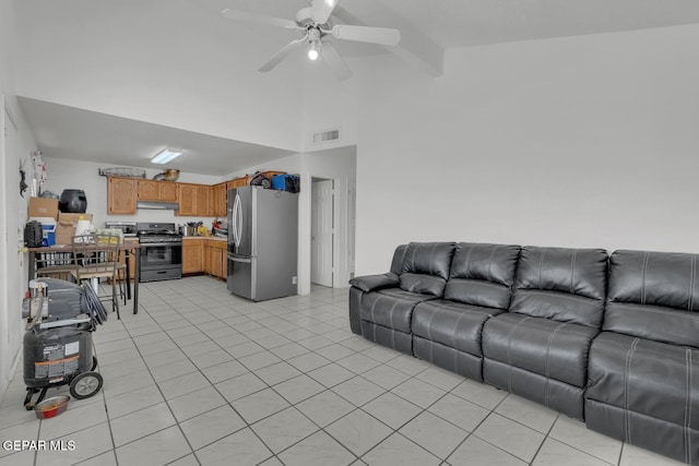 living room featuring light tile patterned floors, visible vents, a ceiling fan, high vaulted ceiling, and beamed ceiling