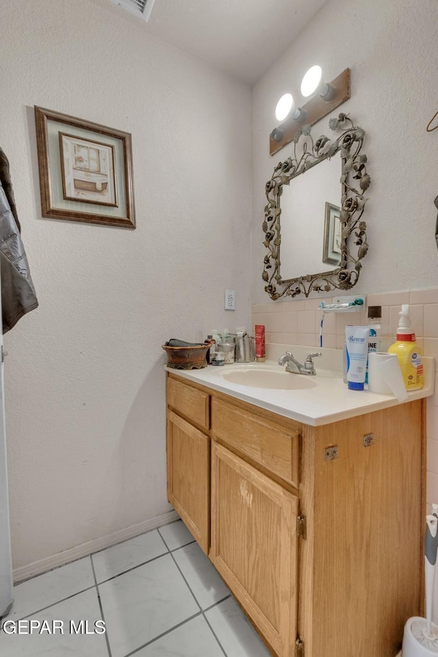 bathroom featuring vanity and tile patterned floors