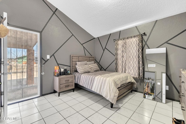 bedroom with lofted ceiling, a textured ceiling, light tile patterned flooring, and access to exterior