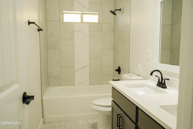 full bath featuring shower / washtub combination, a sink, toilet, and double vanity