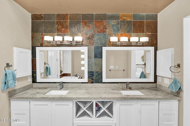 full bath featuring a sink and double vanity