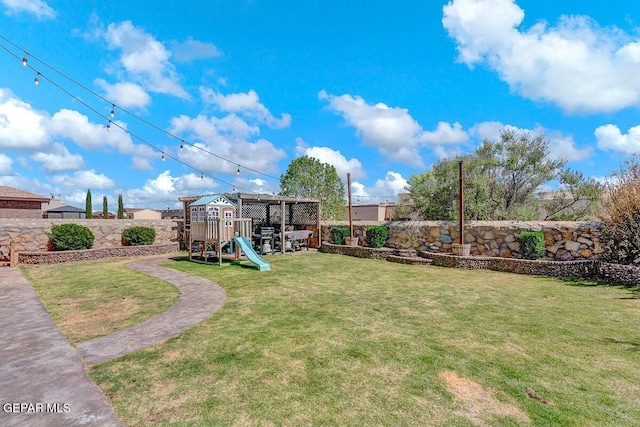 view of yard with a playground