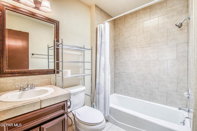 bathroom with shower / bath combination with curtain, backsplash, toilet, vanity, and tile patterned flooring