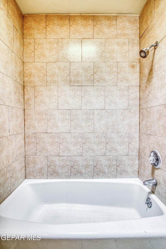 bathroom featuring a tub