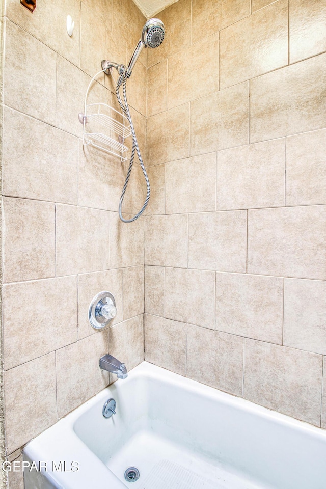 bathroom featuring shower / tub combination