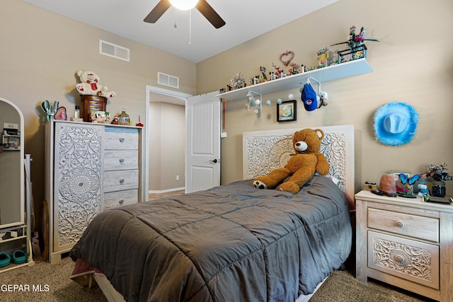 carpeted bedroom with arched walkways, visible vents, and a ceiling fan