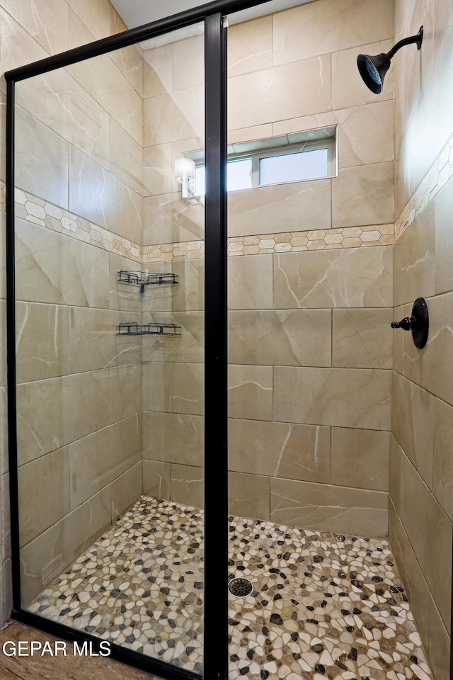 full bathroom with a stall shower