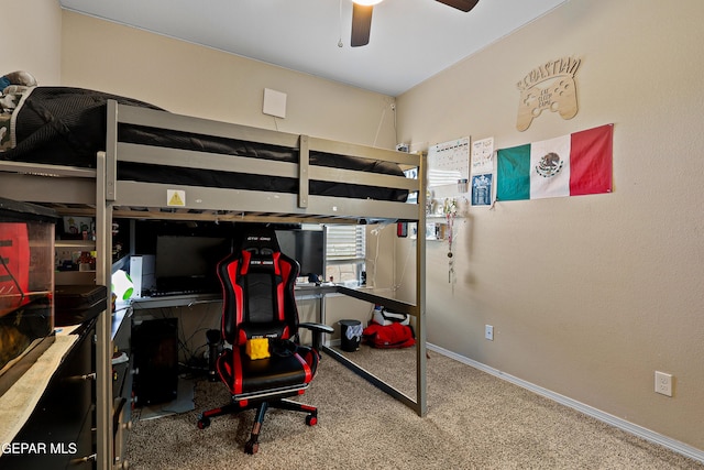 carpeted bedroom with baseboards