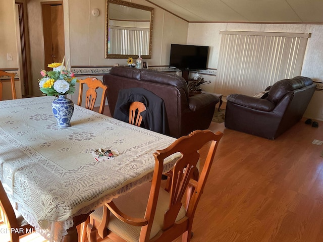 770 Eagles Den Ln, El Paso, TX 79927 - dining space with vaulted ceiling and wood finished floors